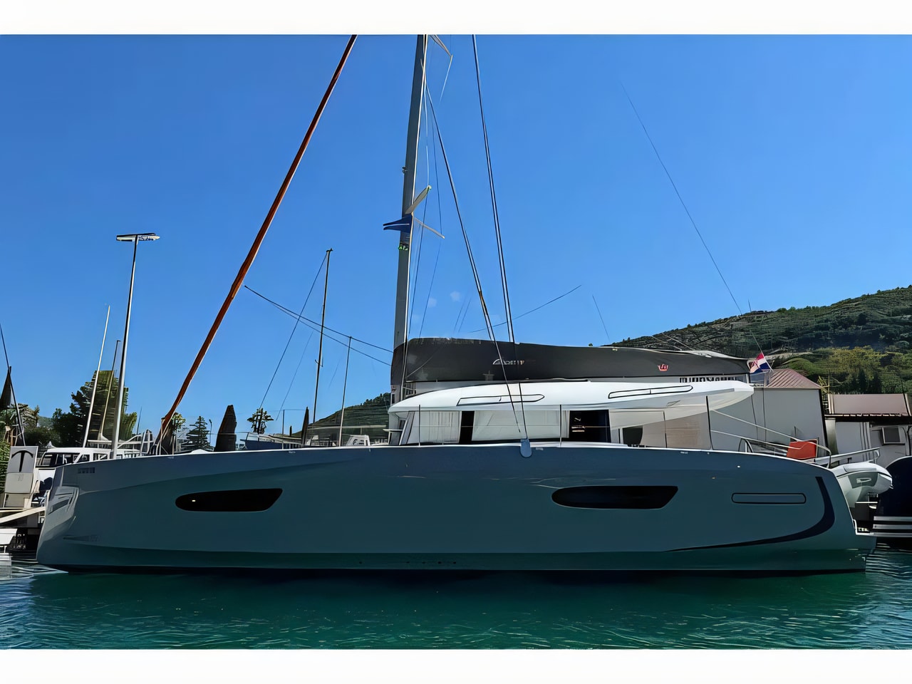 Exterior overview of Excess 14 catamaran for charter from Dubrovnik ACI Marina in the Dubrovnik sailing area Croatia