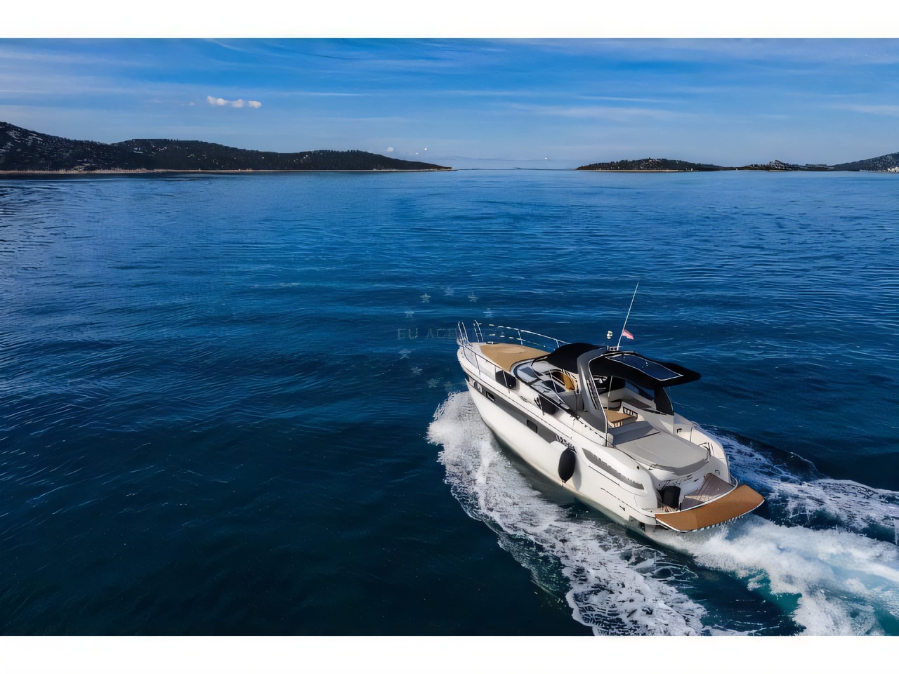 Exterior overview of Bavaria 300 motor boat for charter from Tribunj in the Sibenik sailing area Croatia