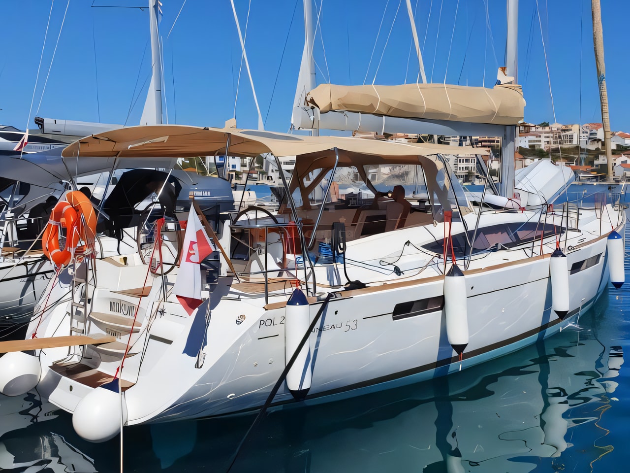 Exterior overview of Jeanneau 53 sail boat for charter from Rogoznica Marina Frapa in the Sibenik sailing area Croatia