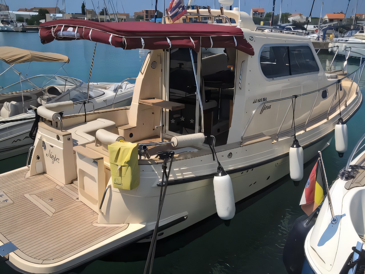 Exterior overview of Damor 980 Fjera motor boat for charter from Murter ACI Marina Jezera in the Sibenik sailing area Croatia