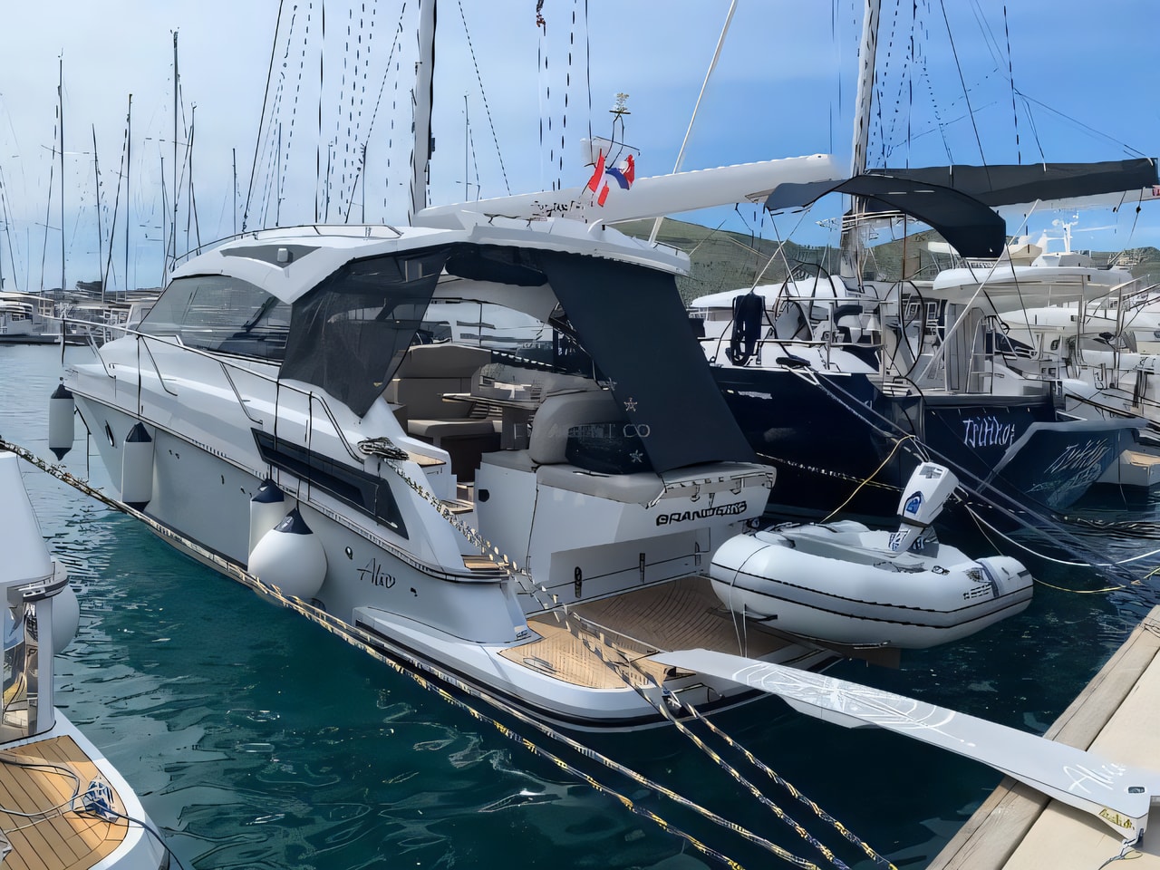 Exterior overview of Grandezza 34 OC motor boat for charter from SCT Marina Trogir in the Split sailing area Croatia
