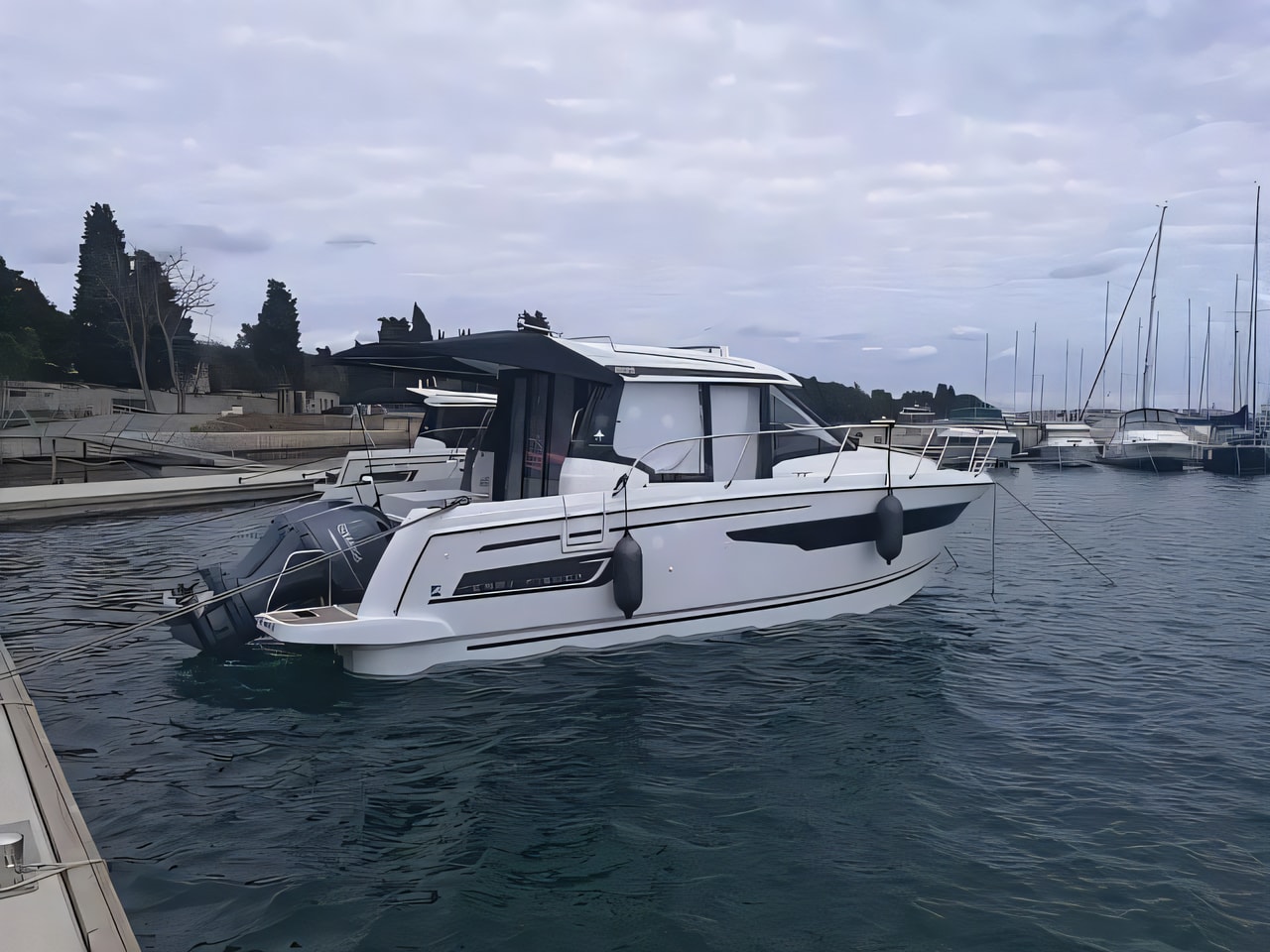 Exterior overview of Merry Fisher 895 motor boat for charter from Pula Marina Polesana in the Istria / Kvarner sailing area Croatia